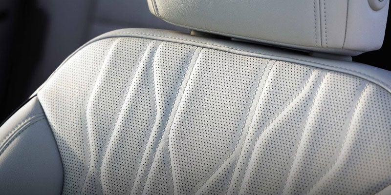 Buick Enclave Sport Touring interior close-up showing perforated leather seat design