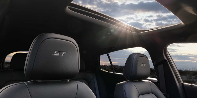 2026 Buick Envista interior featuring leather seats and panoramic moonroof