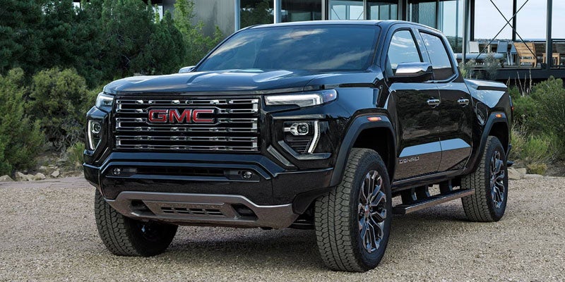 Black 2026 GMC Canyon pickup truck parked outdoors